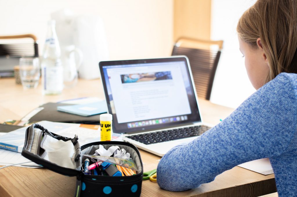 girl using laptop